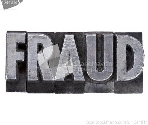 Image of fraud word in metal type
