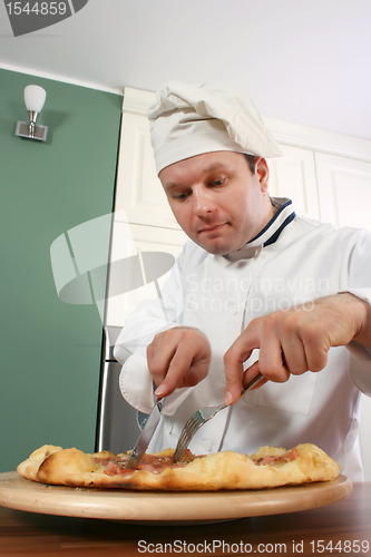 Image of Chef and pizza