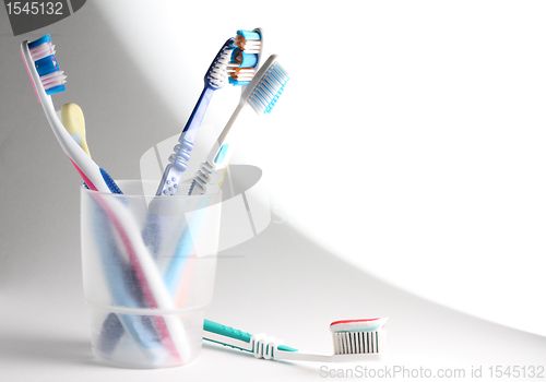 Image of Toothbrushes in a glass