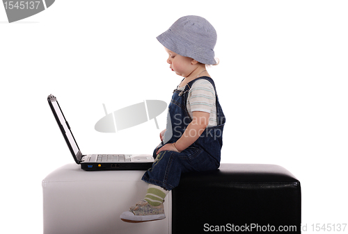 Image of Little boy with a laptop