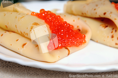Image of pancake with red caviar