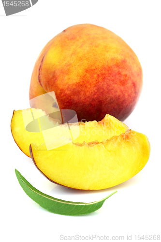 Image of Ripe peach with slices