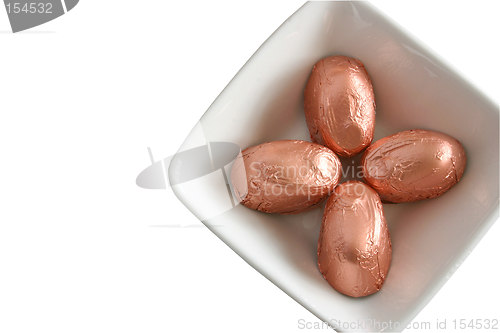 Image of foil covered candy in a dish