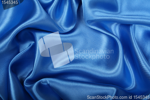 Image of Smooth elegant blue silk can use as background 