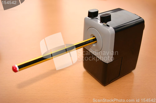 Image of pencil in a desk sharpener