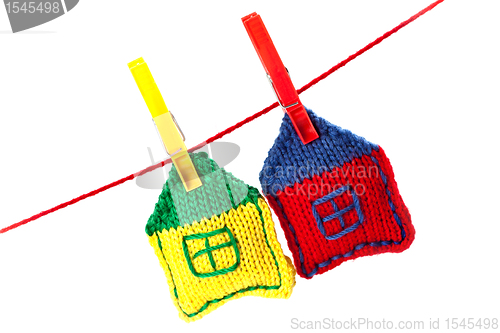 Image of two knitted colorful houses