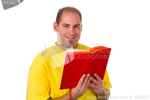 Image of Young man reading a book