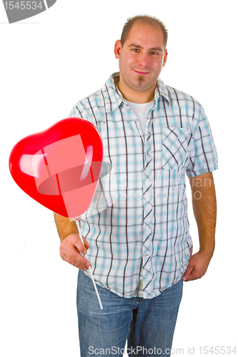 Image of Young man with red heart ballon