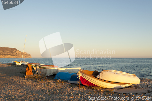 Image of Fishing boats at sunset