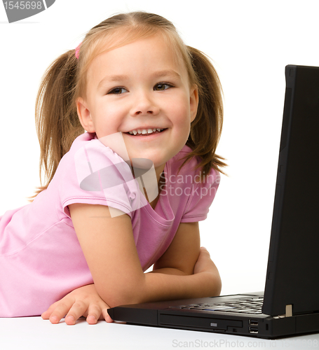 Image of Little girl with laptop