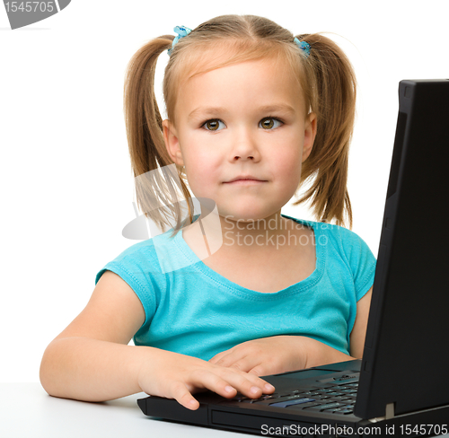 Image of Little girl with laptop