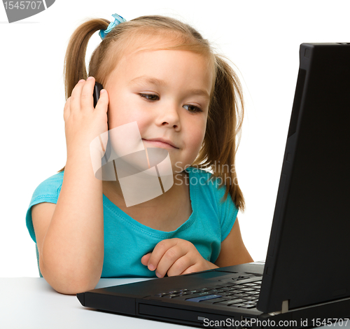 Image of Little girl with laptop