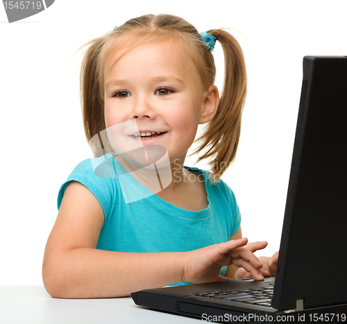 Image of Little girl with laptop