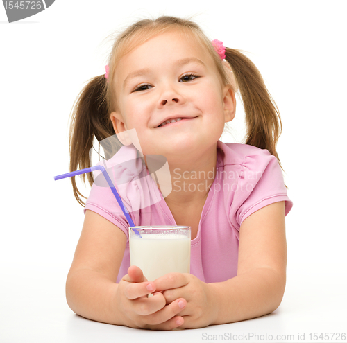 Image of Little girl with a glass of milk