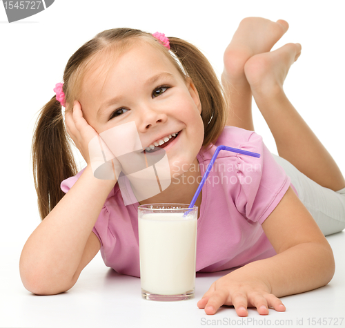 Image of Little girl with a glass of milk