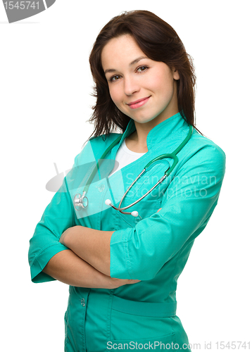 Image of Young attractive woman wearing a doctor uniform