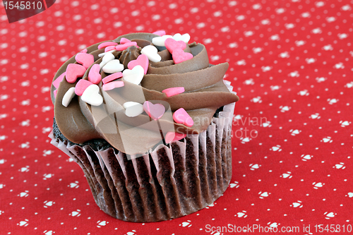 Image of Chocolate Cupcake with Heart Sprinkles