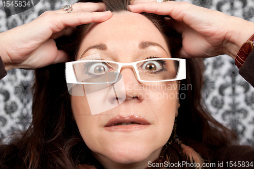 Image of Scared and Startled Woman Close Up