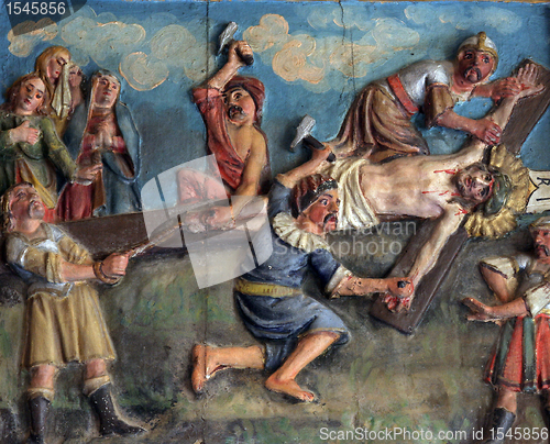Image of Crucifixion: Jesus is nailed to the cross