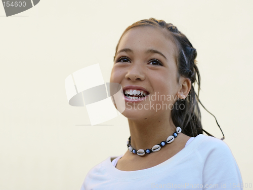 Image of Happy girl with a necklace