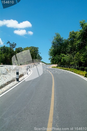 Image of Winding road over a hill