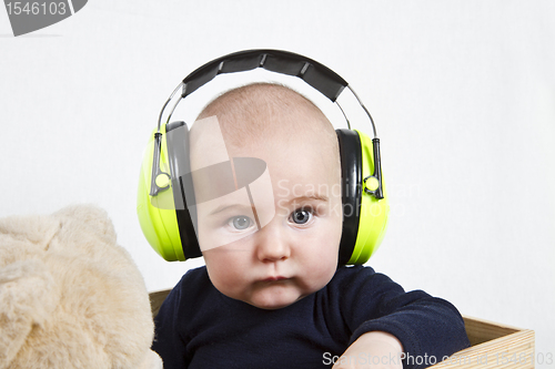 Image of baby with ear protection