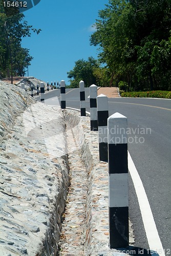 Image of Winding country-road over a hill