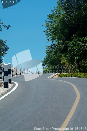 Image of Winding road over a hill