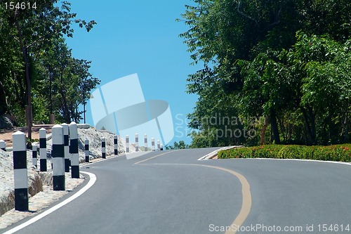 Image of Winding road over a hill