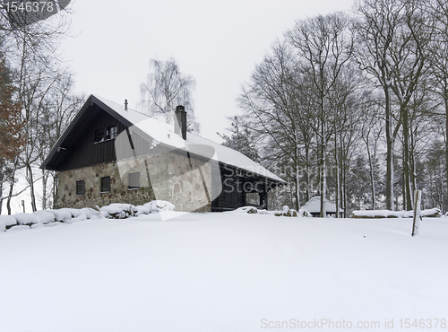 Image of cottage in winter ambiance