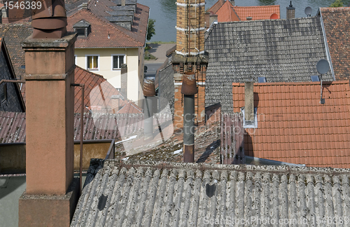 Image of rsunny illuminated roof scenery in Miltenberg