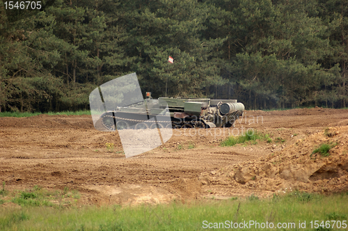 Image of offroad scenery with driving tank