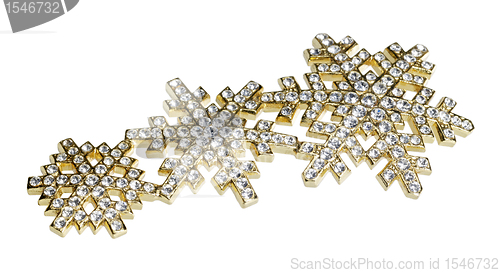 Image of golden jewellery with diamonds