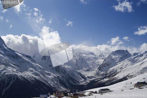 Image of Cafe and hotels in high mountains. Ski resort.