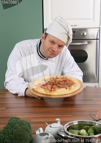 Image of Chef and pizza