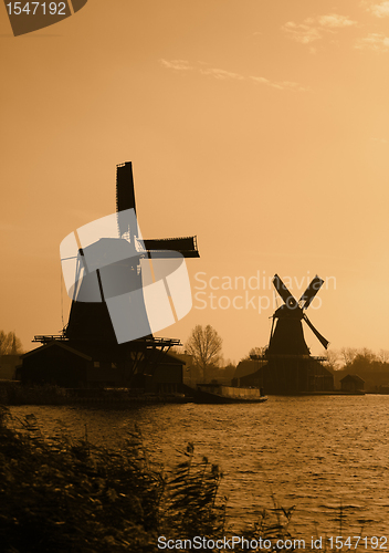 Image of Dutch windmills silhouettes