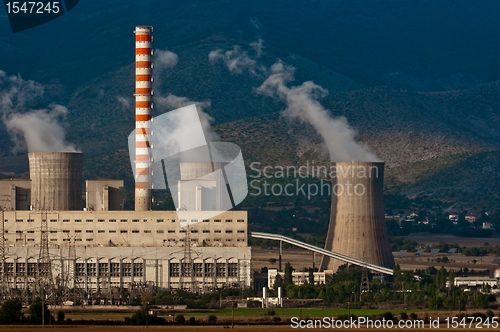 Image of Fumes coming out of power plant