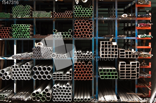 Image of Pipes stacked up in a factory 