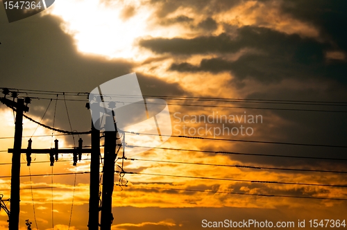 Image of High voltage post against sky