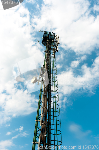 Image of Steel radio tower against blue sky