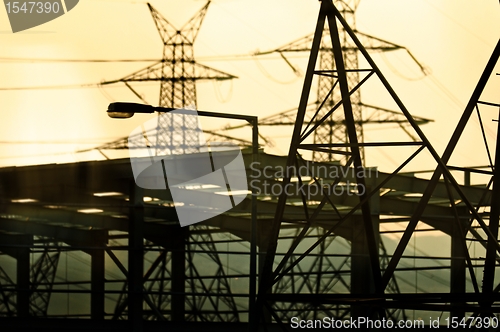 Image of Industrial scene with frames and electric towers
