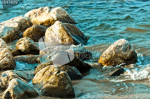 Image of Rocks on the shore of an ocean