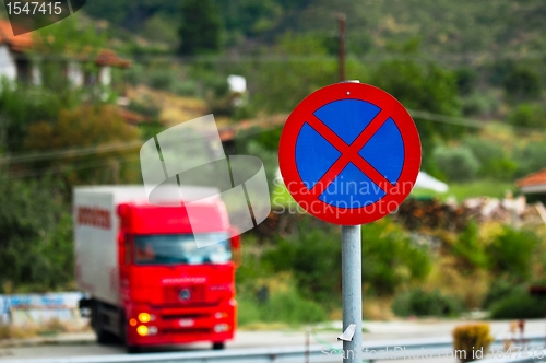 Image of Traffic sign with car in the background