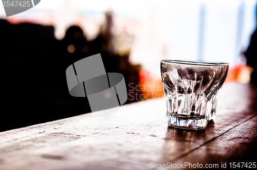 Image of Coctail glass on the bar at a beach club