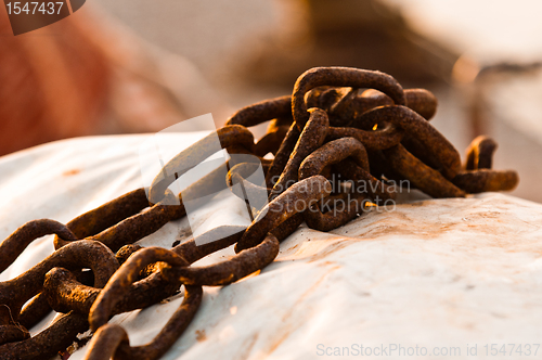 Image of Rusty old chains of a boat