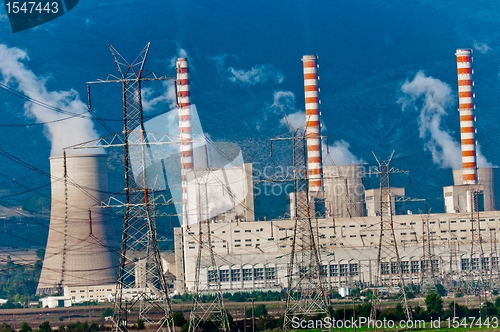 Image of Fumes coming out of power plant