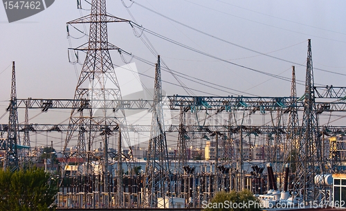 Image of Electic power generator with cables and pylons