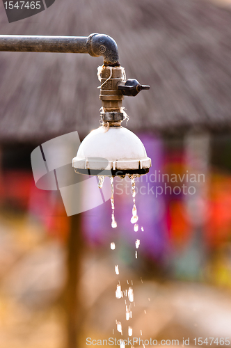 Image of Water flowing out of shower at the beach