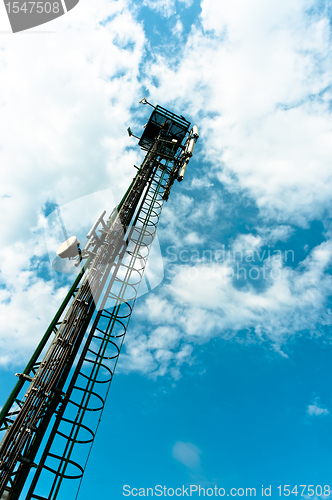 Image of Steel radio tower against blue sky