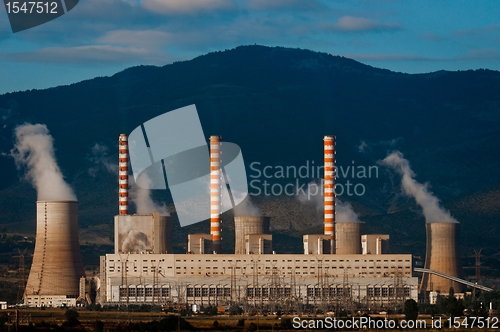 Image of Fumes coming out of power plant